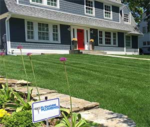 Lush green lawn after sprinkler system repair in Rochester, MN